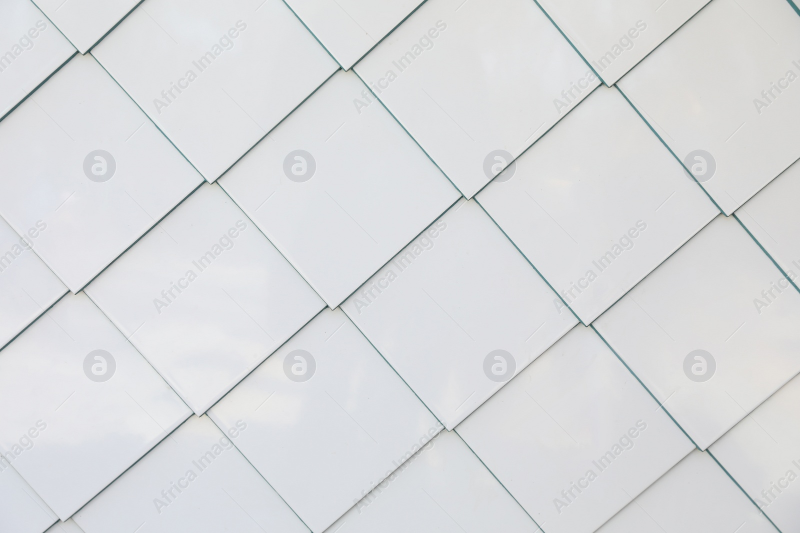 Photo of Texture of white tiled wall as background