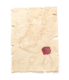 Photo of Sheet of old parchment paper with wax stamp isolated on white, top view. Space for design