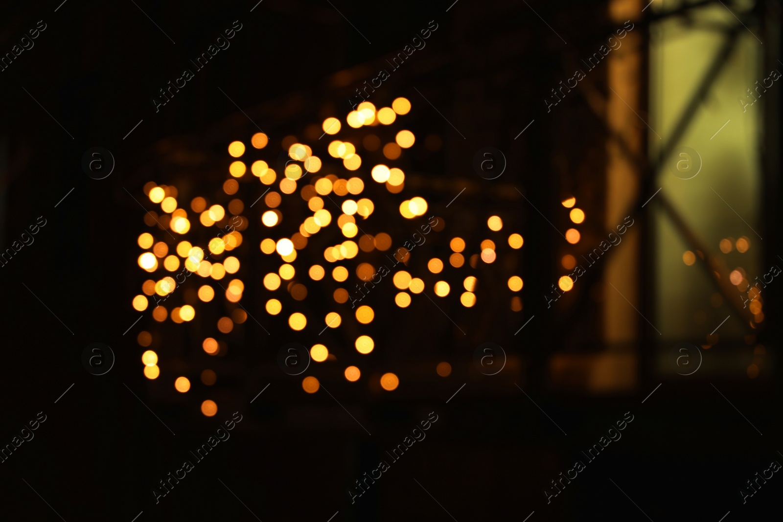 Photo of Beautiful street lights at night. Bokeh effect