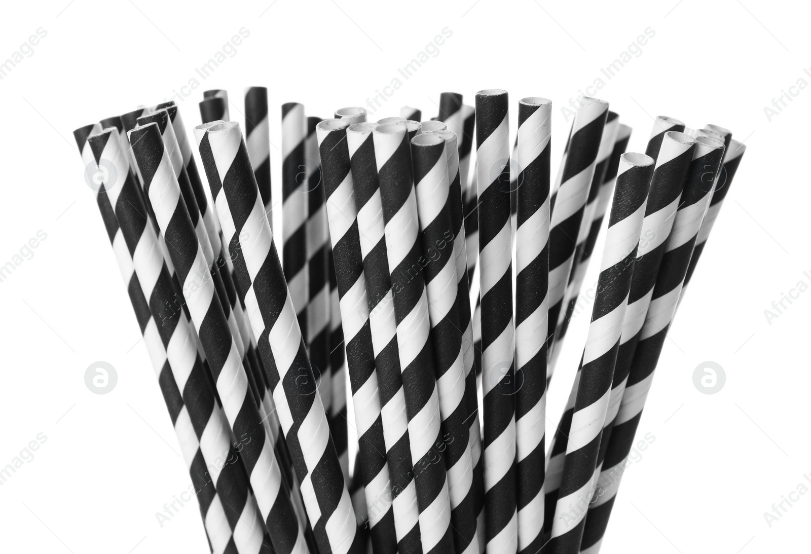 Photo of Striped paper cocktail tubes on white background