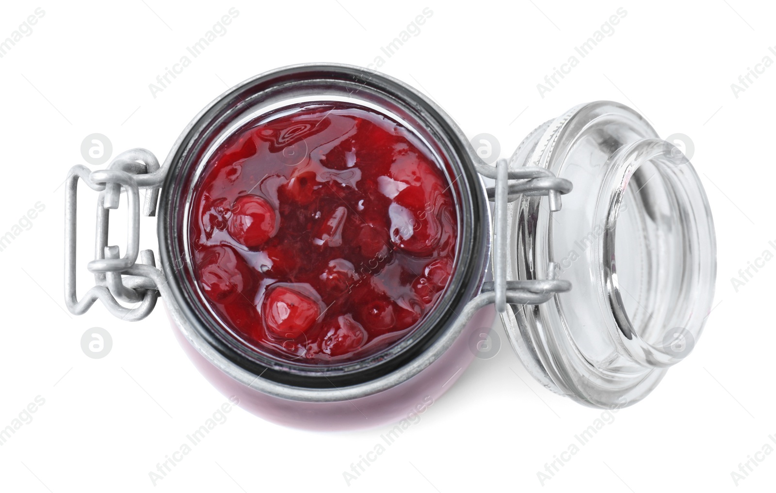 Photo of Fresh cranberry sauce in glass jar isolated on white, top view