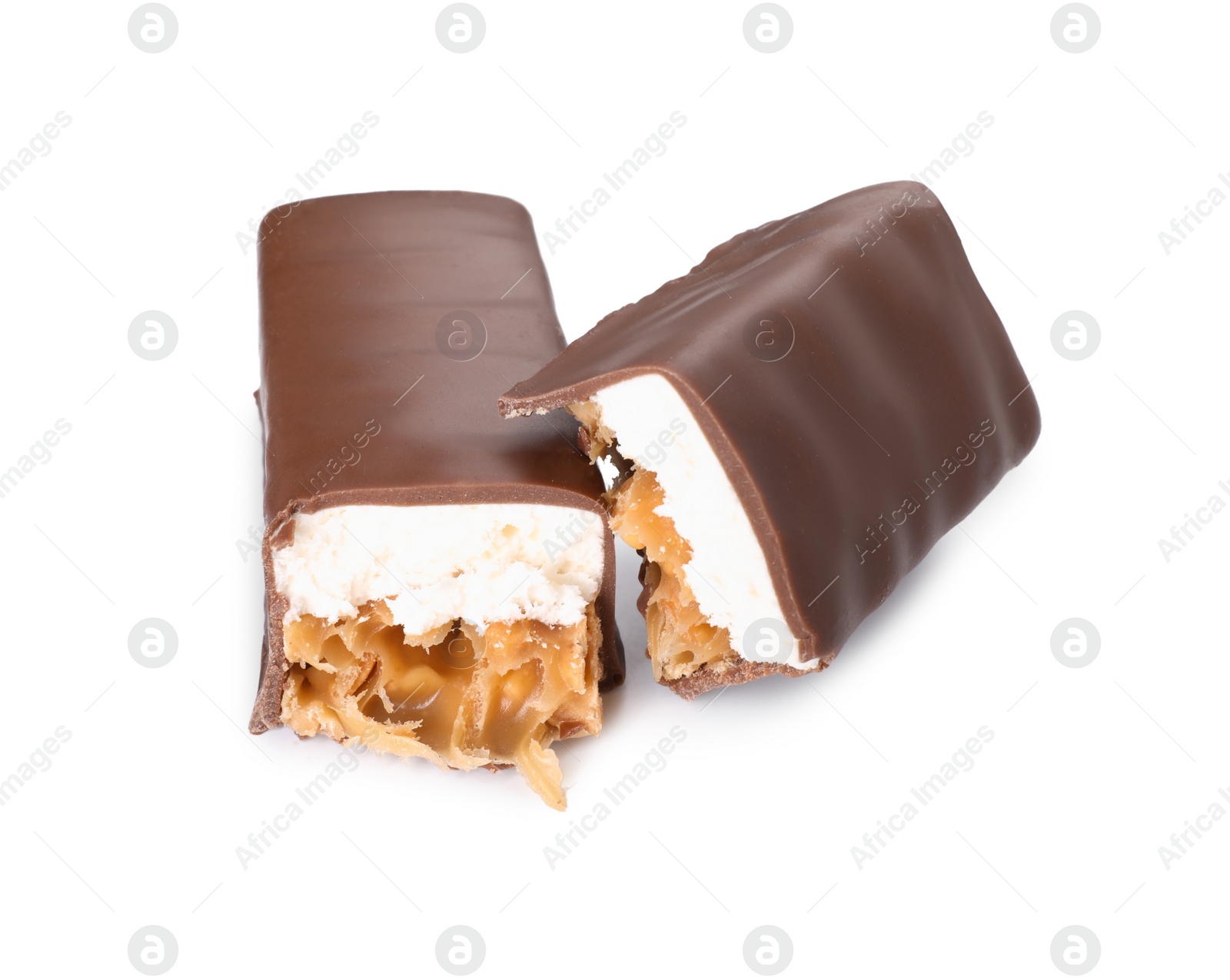 Photo of Pieces of tasty chocolate bars with nougat and nuts on white background