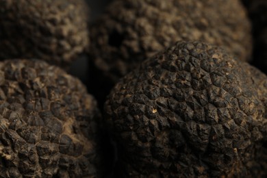 Photo of Closeup view of fresh whole black truffles