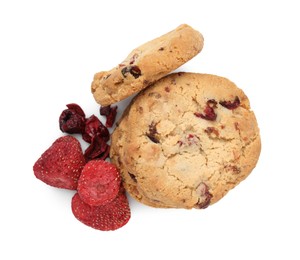 Photo of Cookies and freeze dried fruits isolated on white, top view