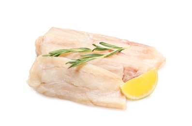 Pieces of raw cod fish, rosemary and lemon isolated on white