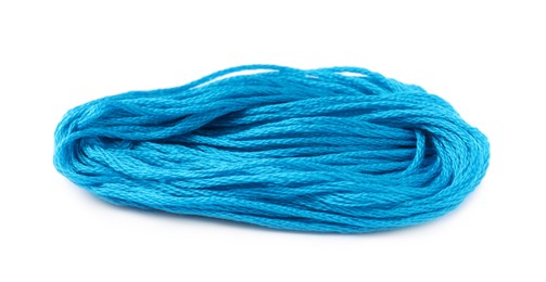 Light blue embroidery thread on white background