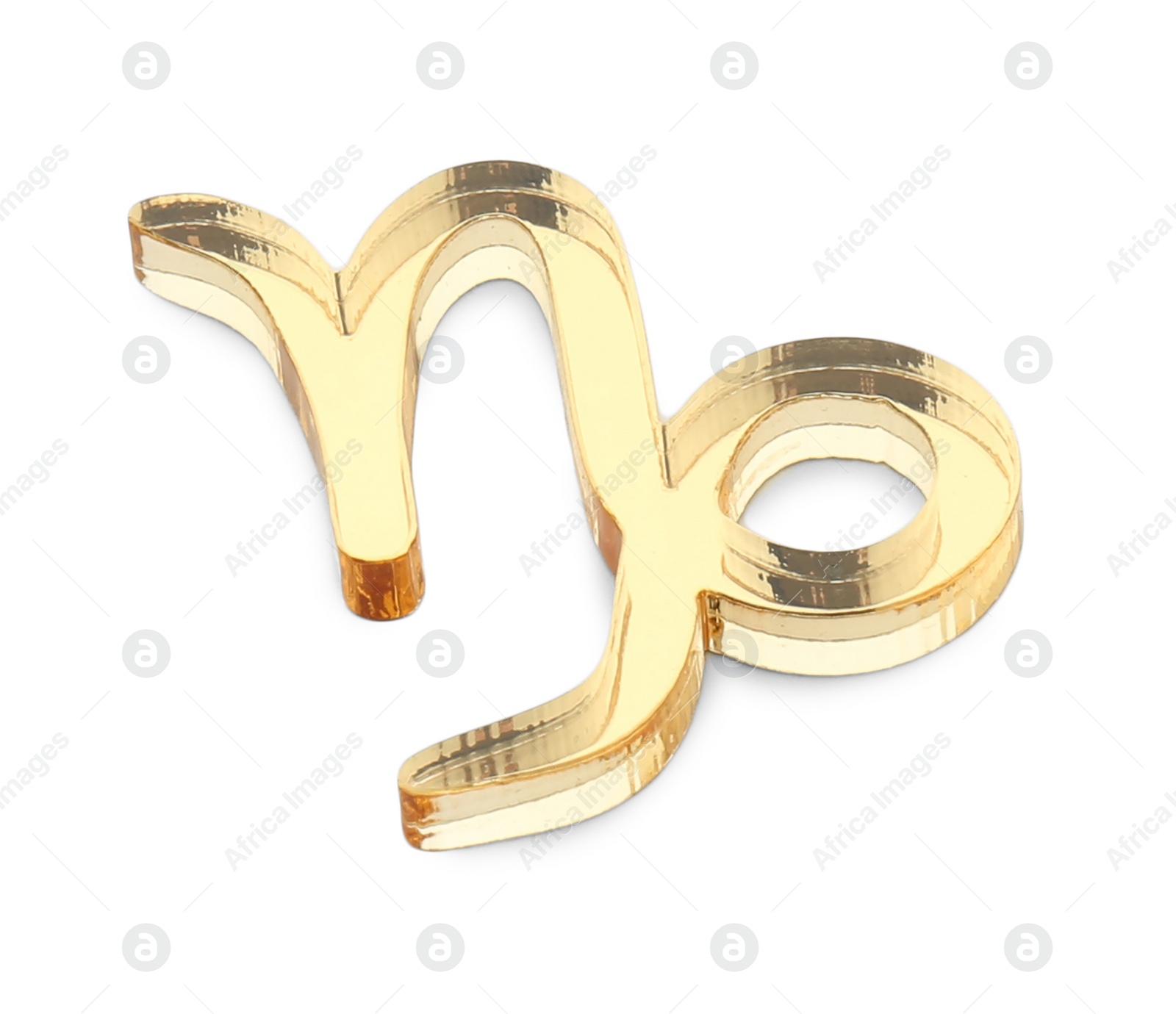 Photo of Zodiac sign. Golden Capricorn symbol isolated on white