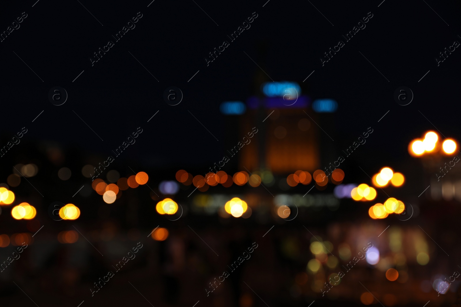 Photo of Blurred view of beautiful city at night. Bokeh effect