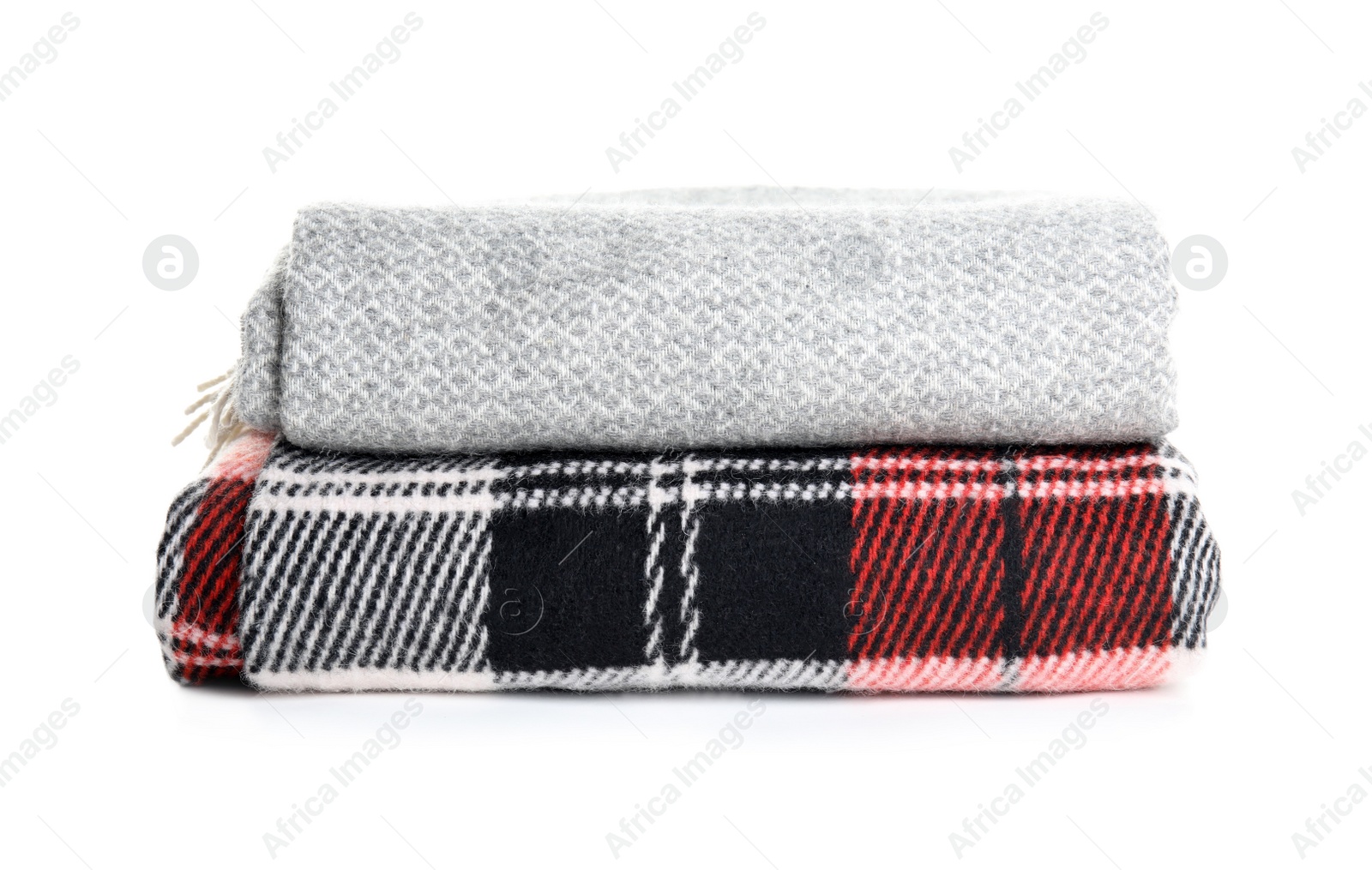 Photo of Different stylish soft plaids on white background