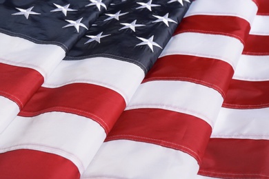 Folded American flag as background, closeup. National symbol of USA