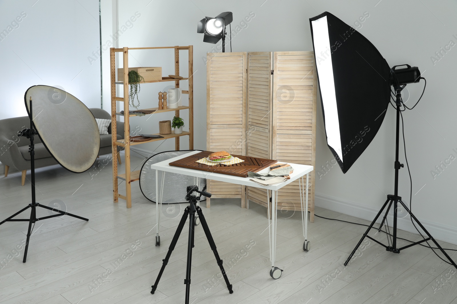 Photo of Tasty sandwich on table in photo studio. Food photography