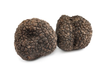 Fresh whole black truffles isolated on white