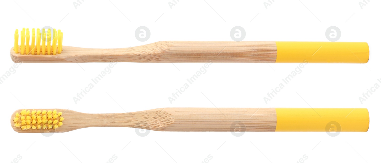 Image of Bamboo toothbrushes with yellow bristles on white background 