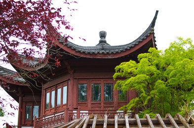 HAREN, NETHERLANDS - MAY 23, 2022: Beautiful view of oriental building in Chinese garden