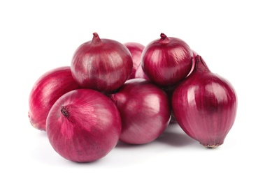 Photo of Fresh whole red onions on white background