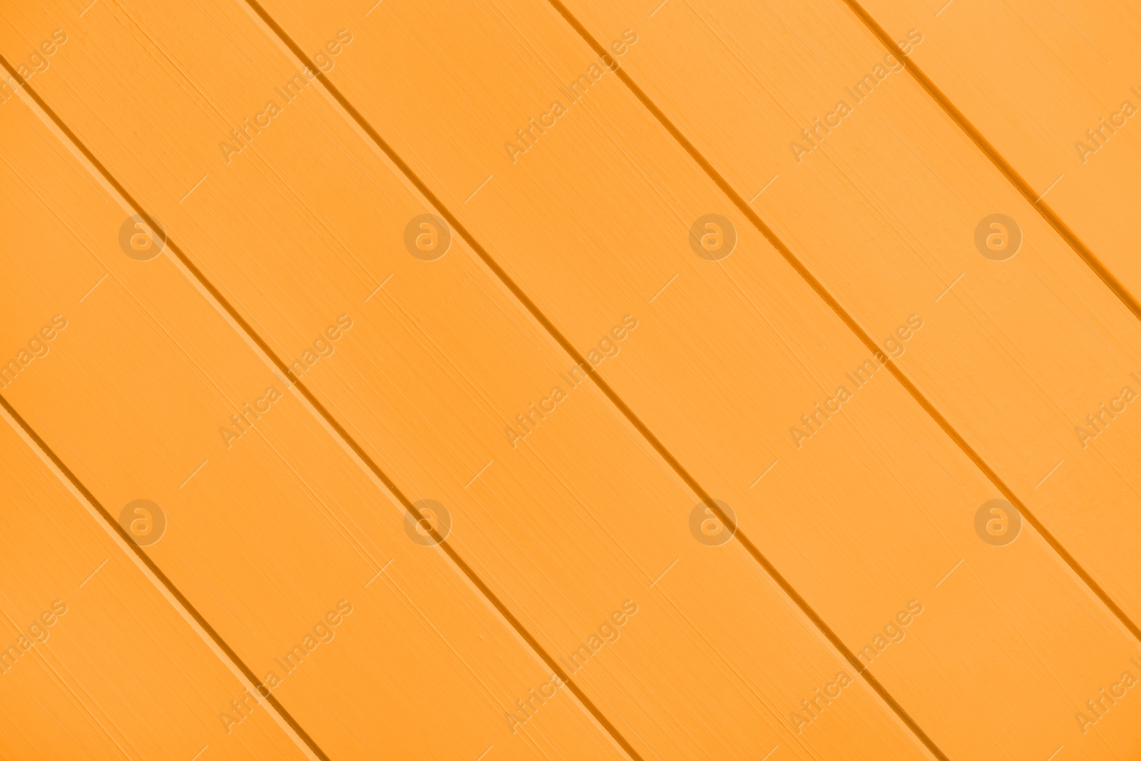 Image of Texture of orange wooden surface, top view