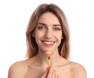 Photo of Young woman using natural jade face roller on white background