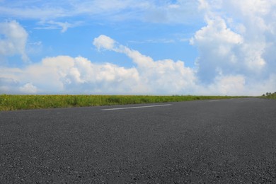 Image of View of empty asphalt road on sunny day