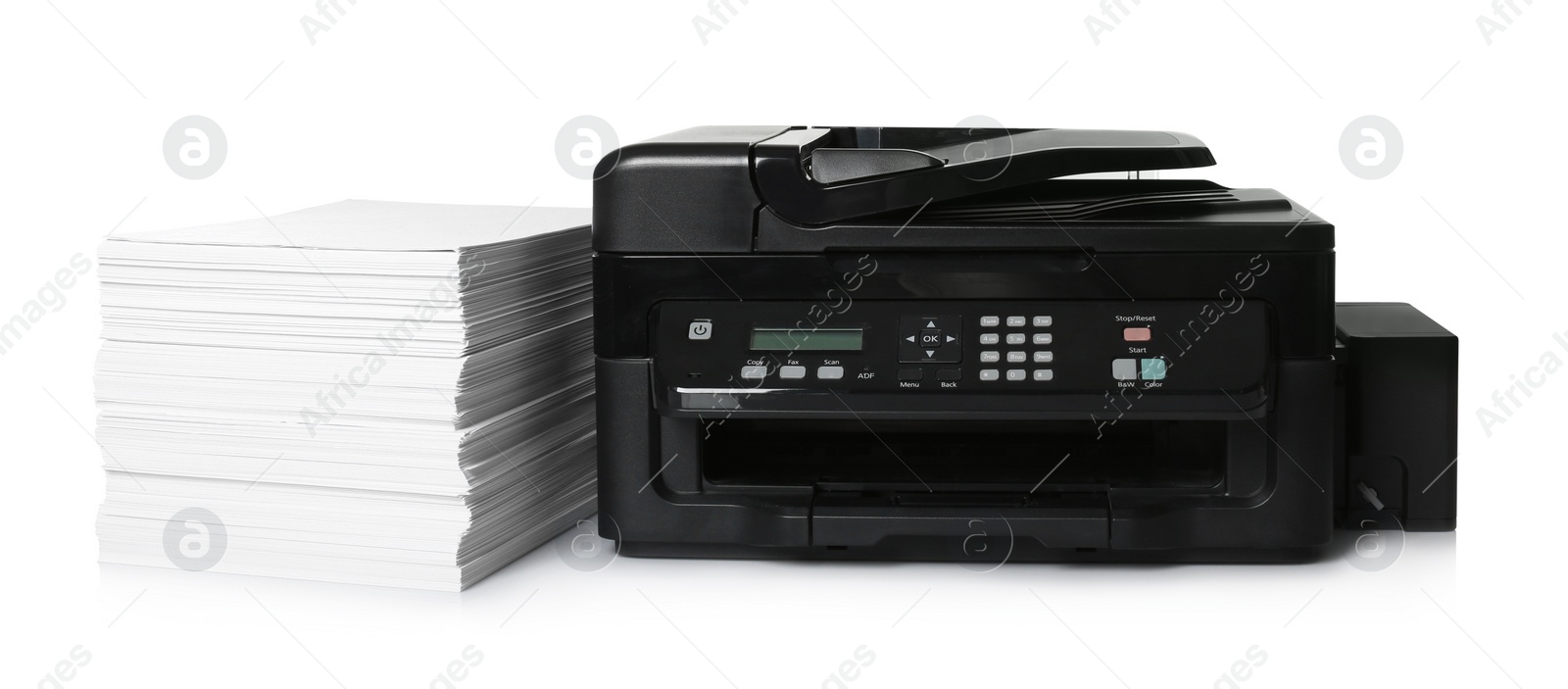 Photo of Modern printer and stack of paper on white background