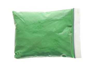 Photo of Green powder in plastic bag isolated on white, top view. Holi festival celebration