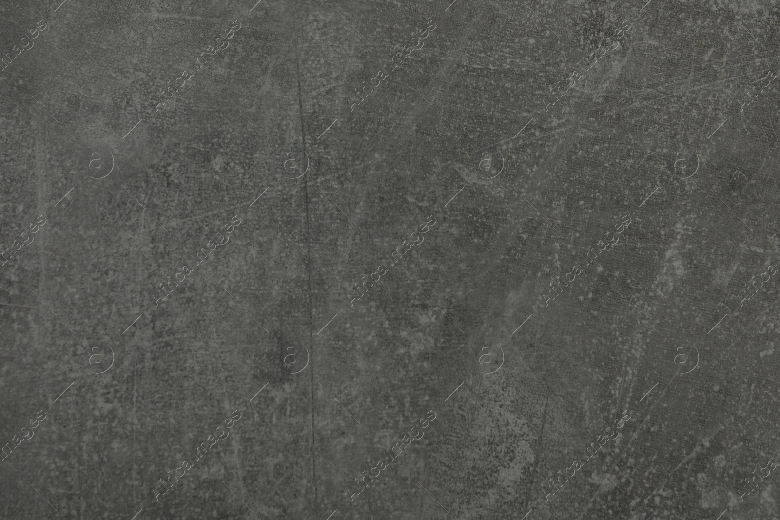 Photo of Texture of grey stone surface as background, closeup