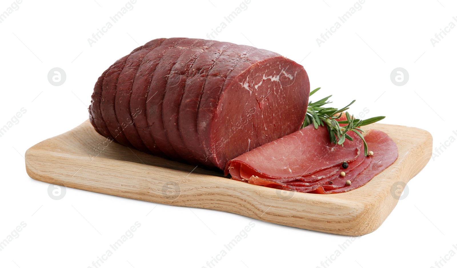 Photo of Tasty fresh dry bresaola, peppercorns and rosemary isolated on white