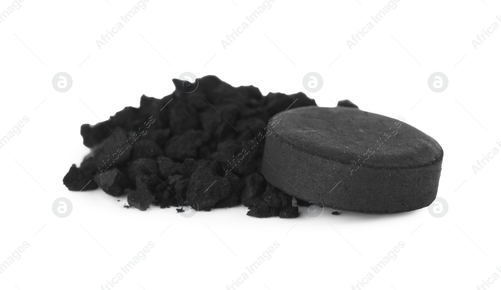 Photo of Activated charcoal on white background. Potent sorbent