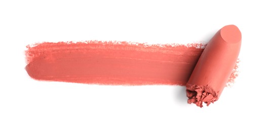 Photo of Lipstick and swatch on white background, top view