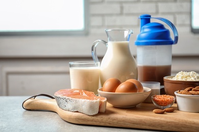 Photo of Different natural food on table. High protein diet