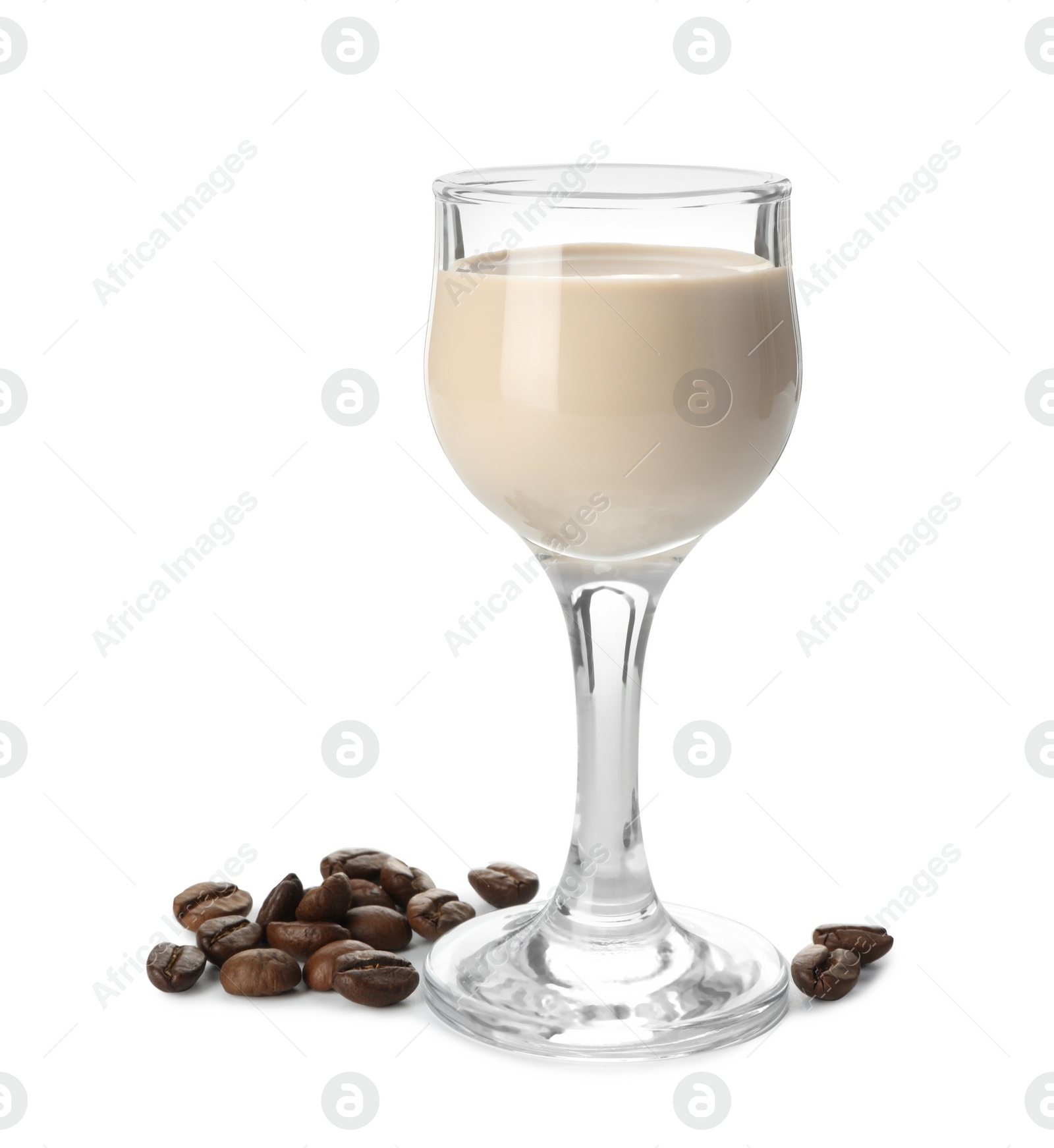 Photo of Glass of coffee cream liqueur and beans isolated on white