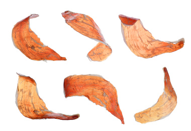 Set of delicious sliced jamon on white background