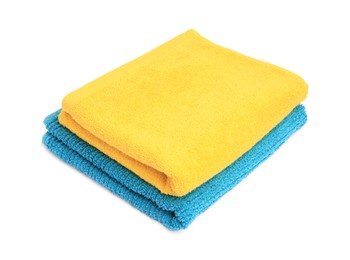 Photo of Two colorful terry towels isolated on white