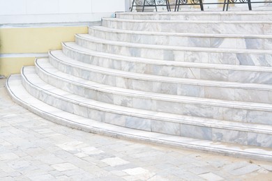 View of stone tiled stairs outdoors. Entrance design