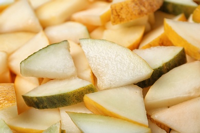 Ripe tasty melon slices as background, closeup view