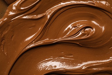 Tasty chocolate paste as background, closeup view