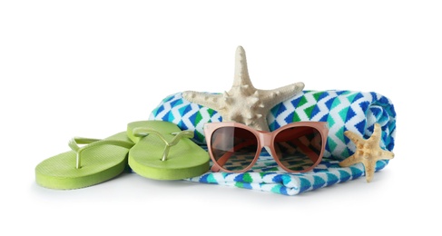 Photo of Composition with beach accessories on white background