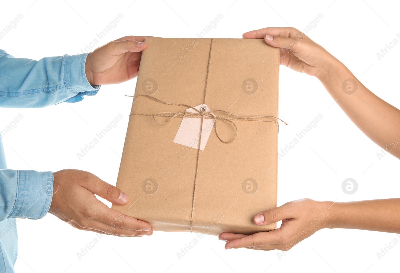 Photo of Woman receiving parcel from courier on white background, closeup