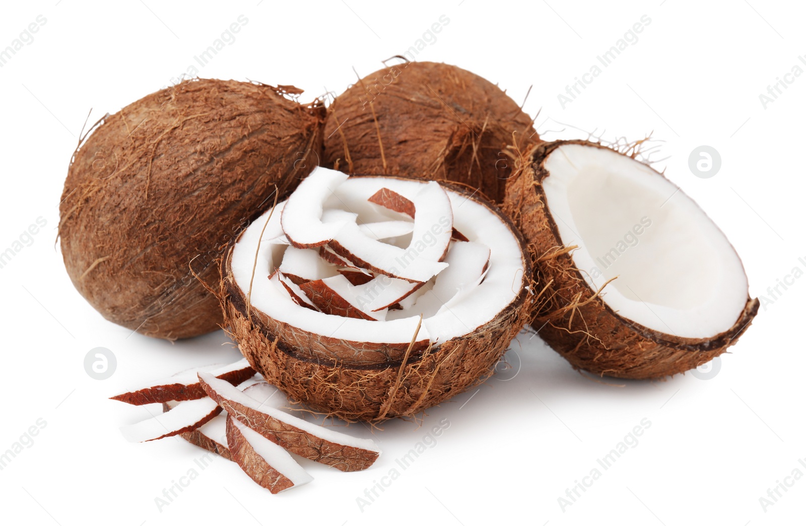 Photo of Coconut pieces and nuts isolated on white
