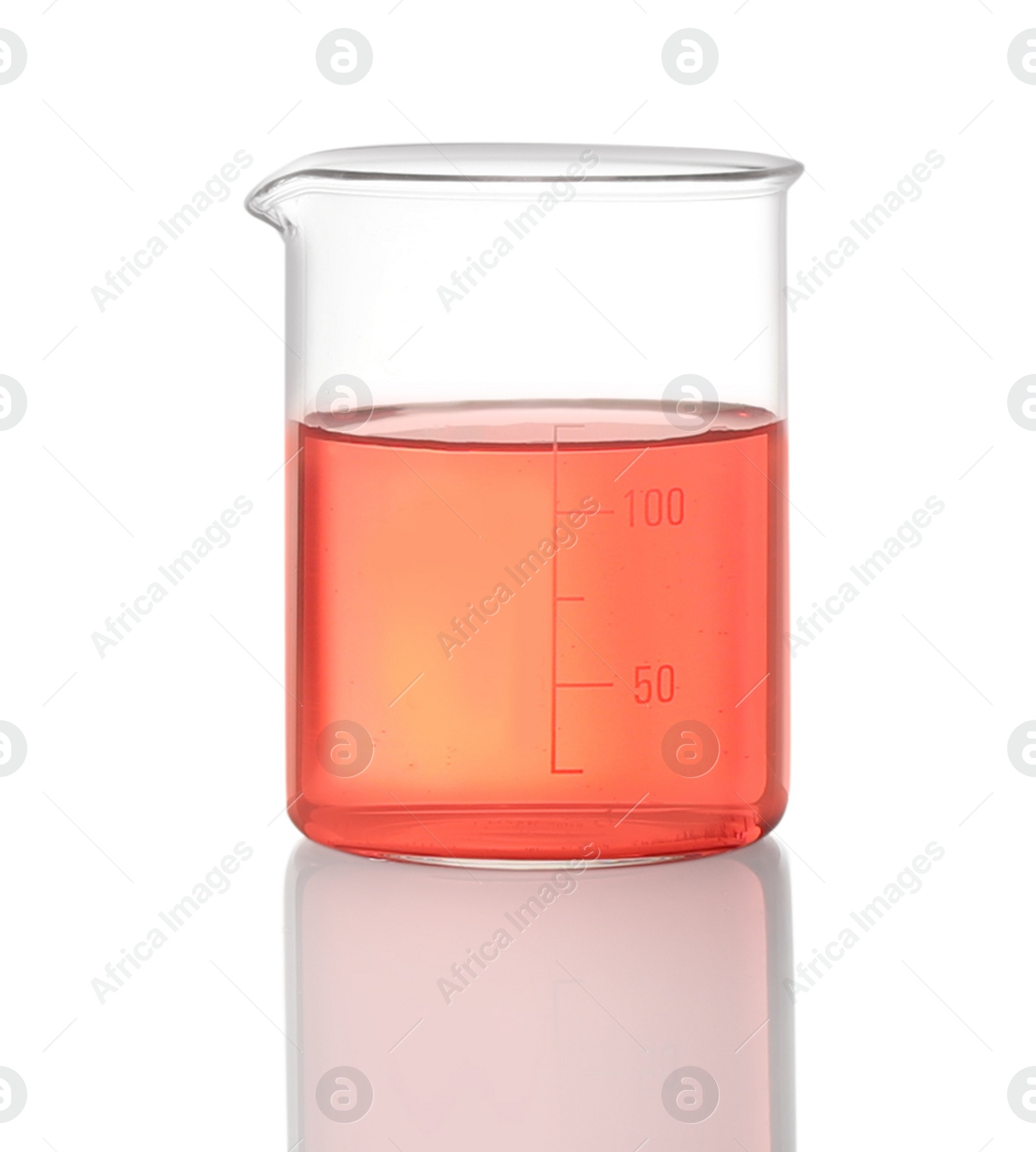 Photo of Beaker with red liquid isolated on white