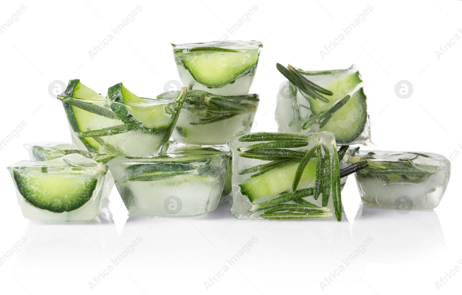 Photo of Ice cubes with cucumber slices and rosemary on white background