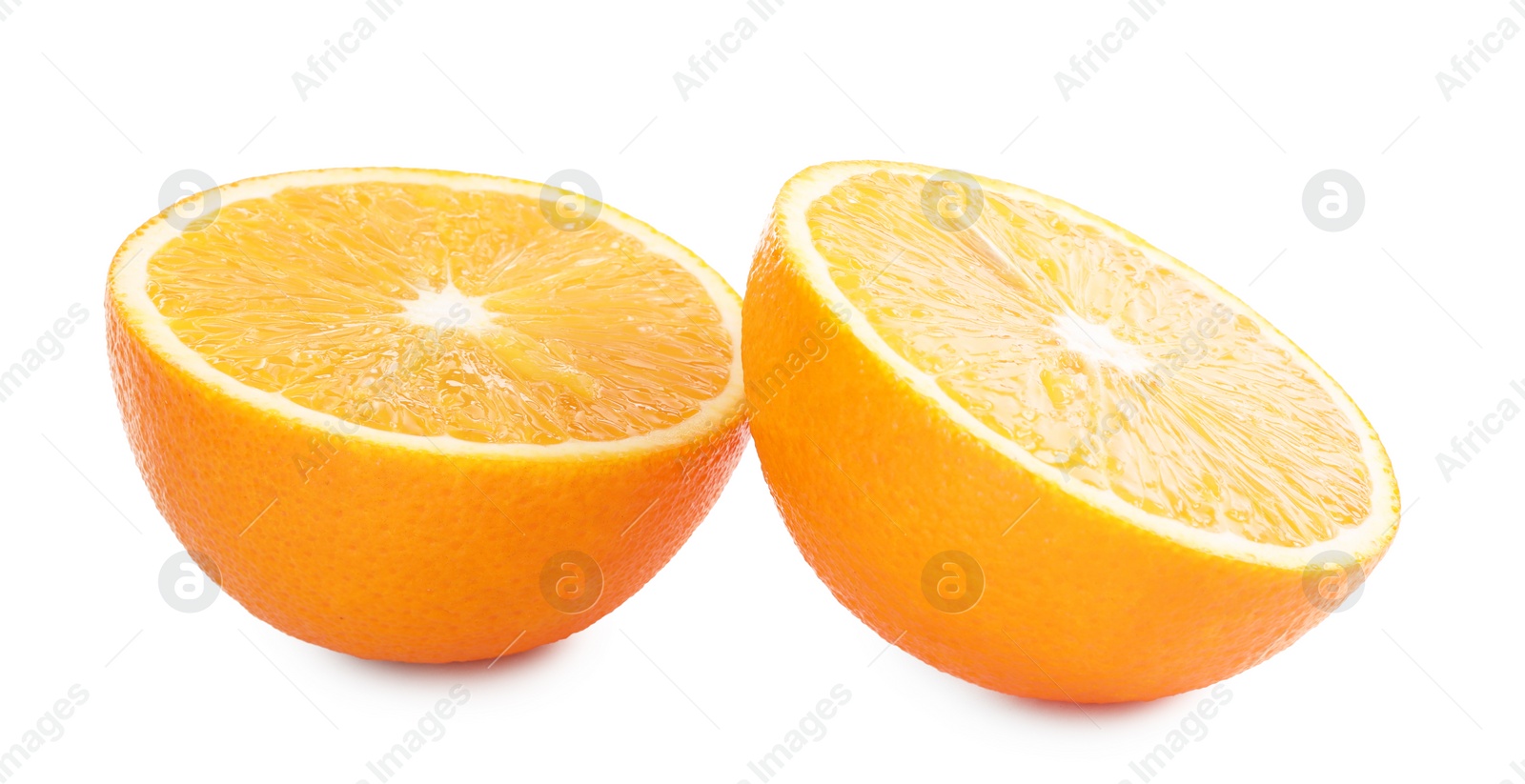 Photo of Halves of fresh ripe orange isolated on white