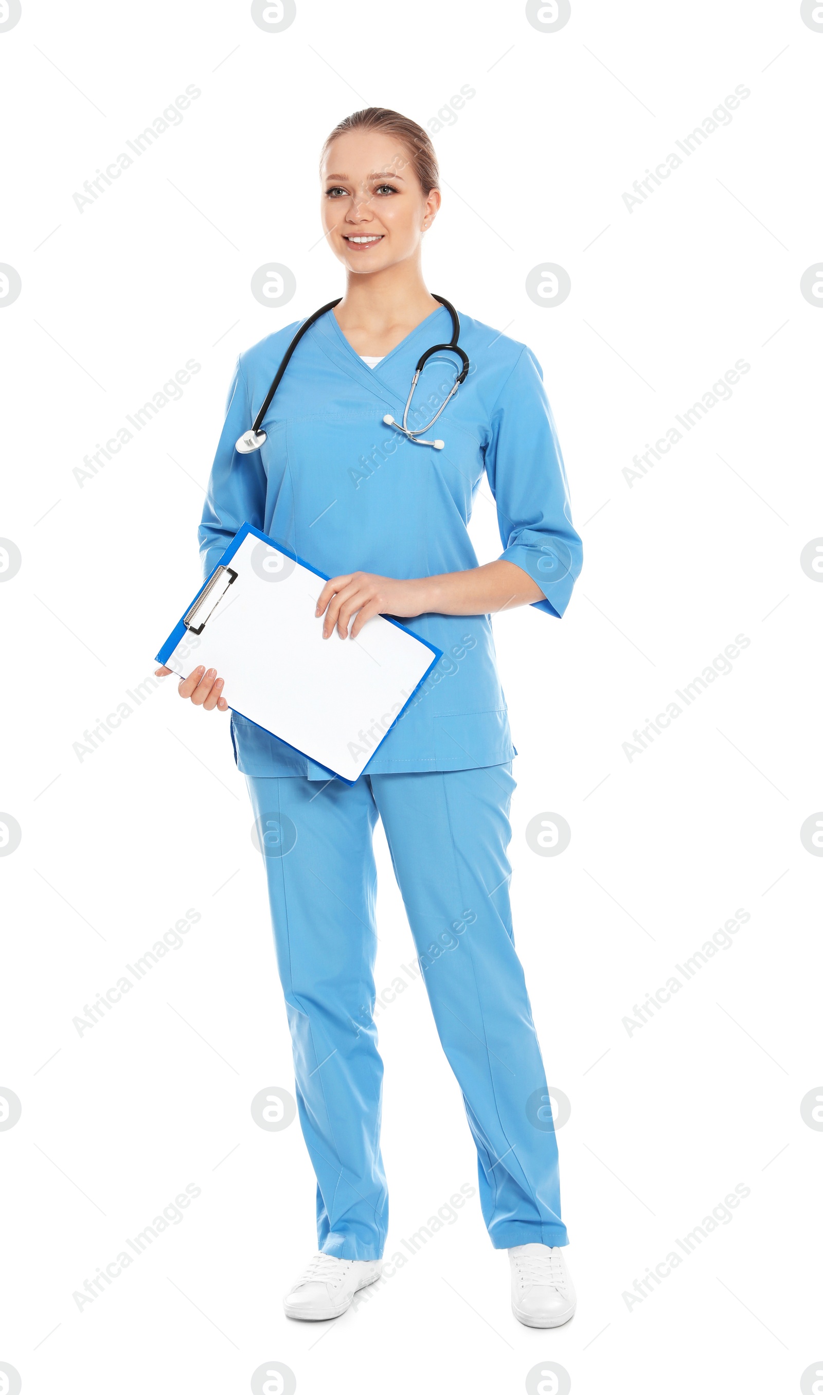 Photo of Full length portrait of medical doctor with clipboard and stethoscope isolated on white