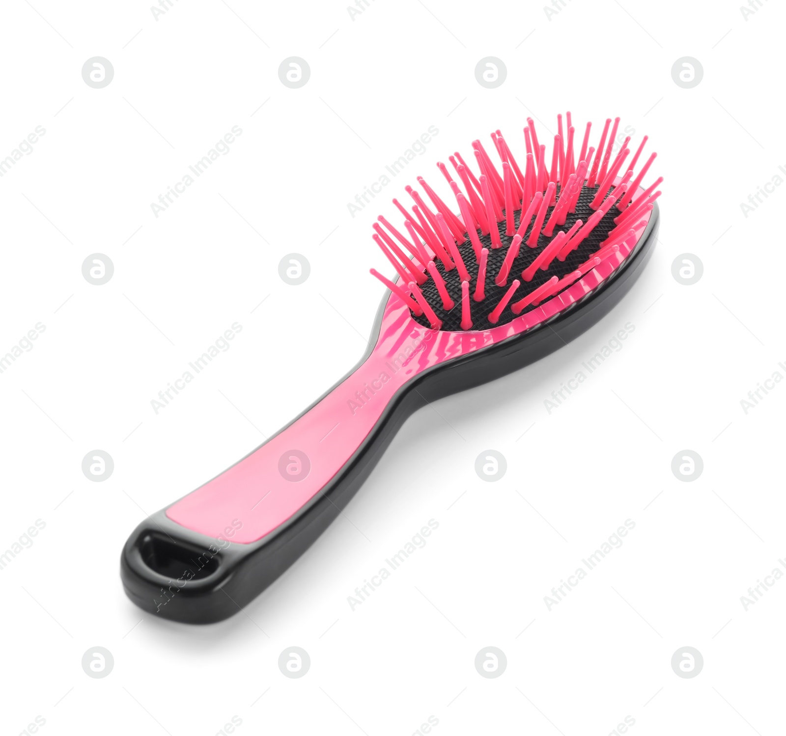 Photo of New modern hair brush isolated on white