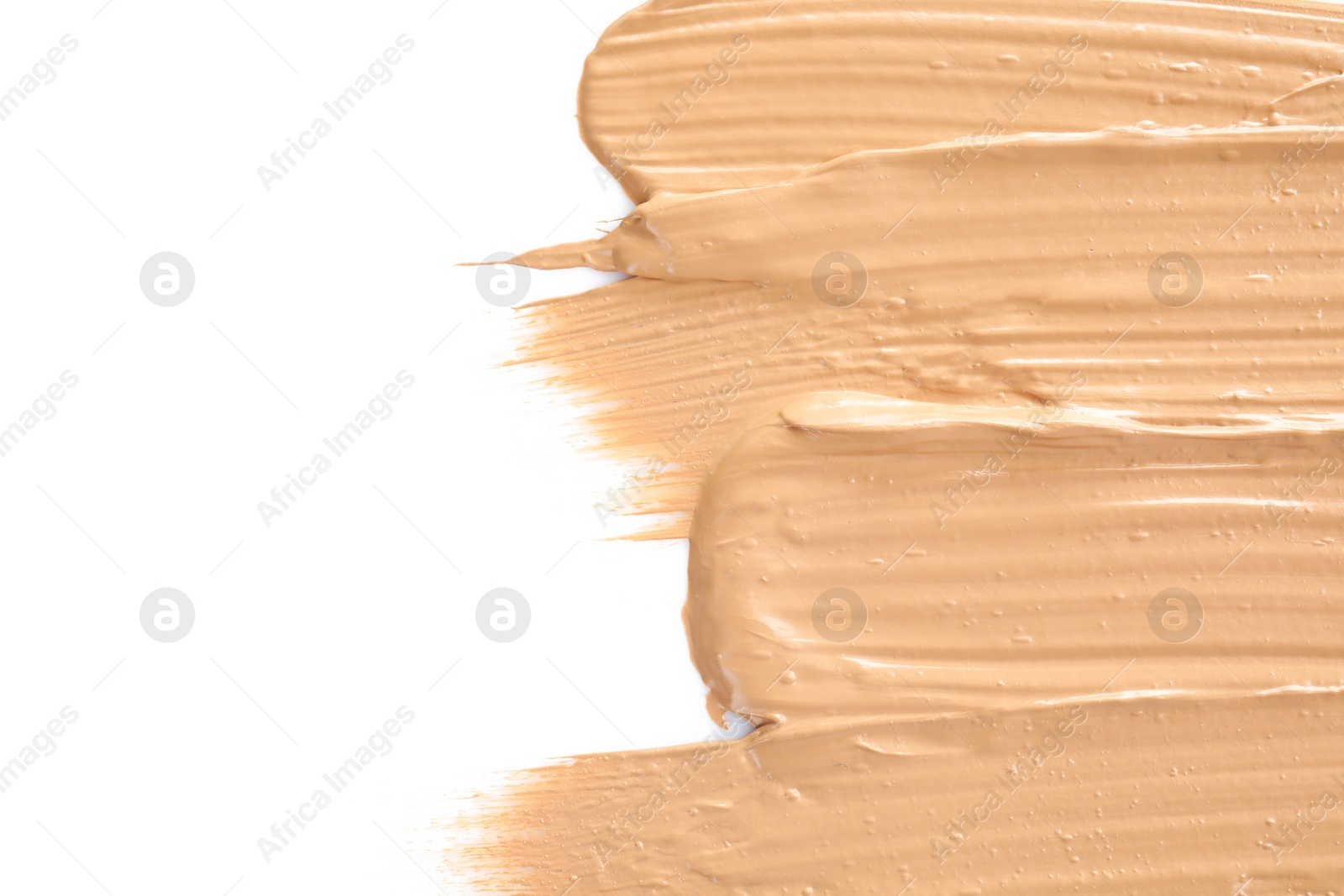 Photo of Liquid foundation on white background, top view. Makeup product