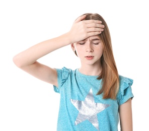 Photo of Teenage girl suffering from headache on white background