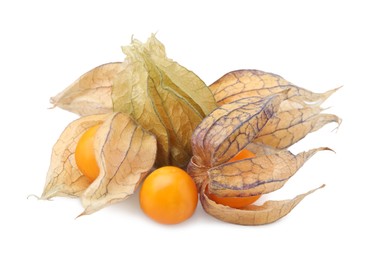 Photo of Many ripe physalis fruits with calyxes isolated on white