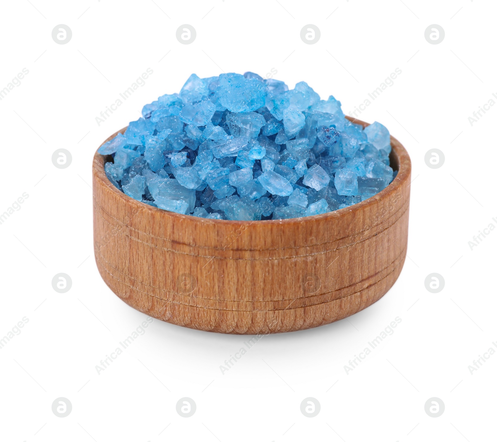 Photo of Wooden bowl with blue sea salt isolated on white