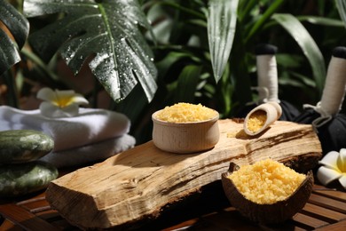 Spa composition with orange sea salt on wooden table