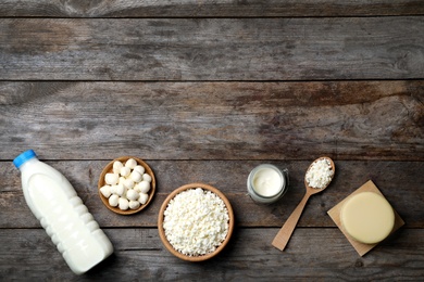 Different dairy products on wooden background