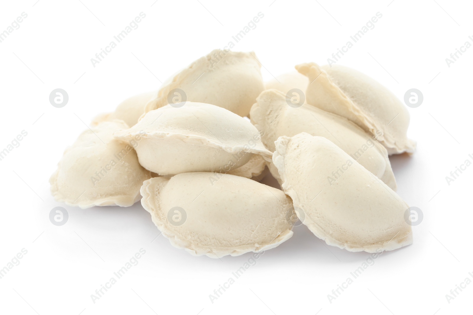 Photo of Heap of raw dumplings on white background